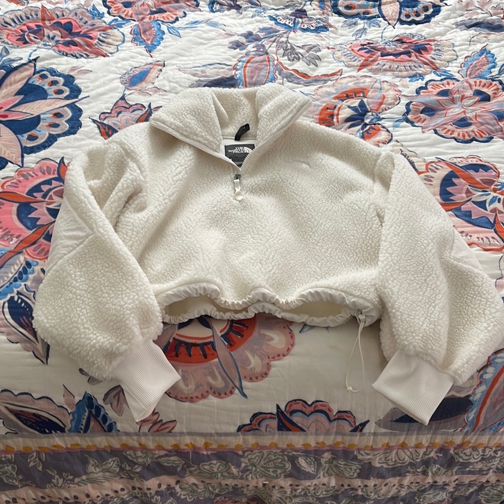 The North Face Sherpa in Gardenia White
